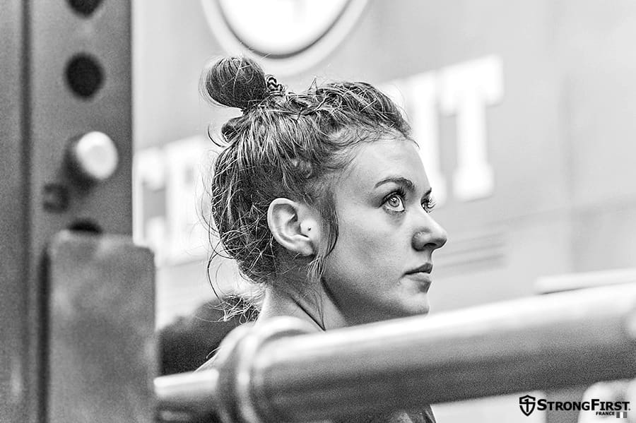 Megan Kelly preparing for a barbell lift